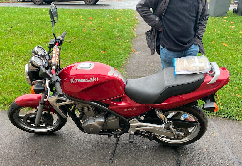 A photo of my soon to be new bike, a red Kawasaki ER-5